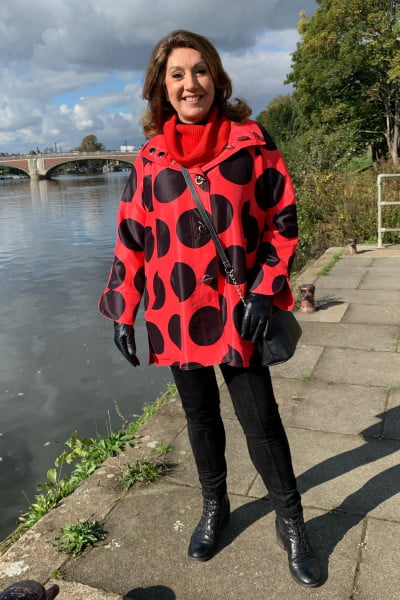 black polka dot raincoat
